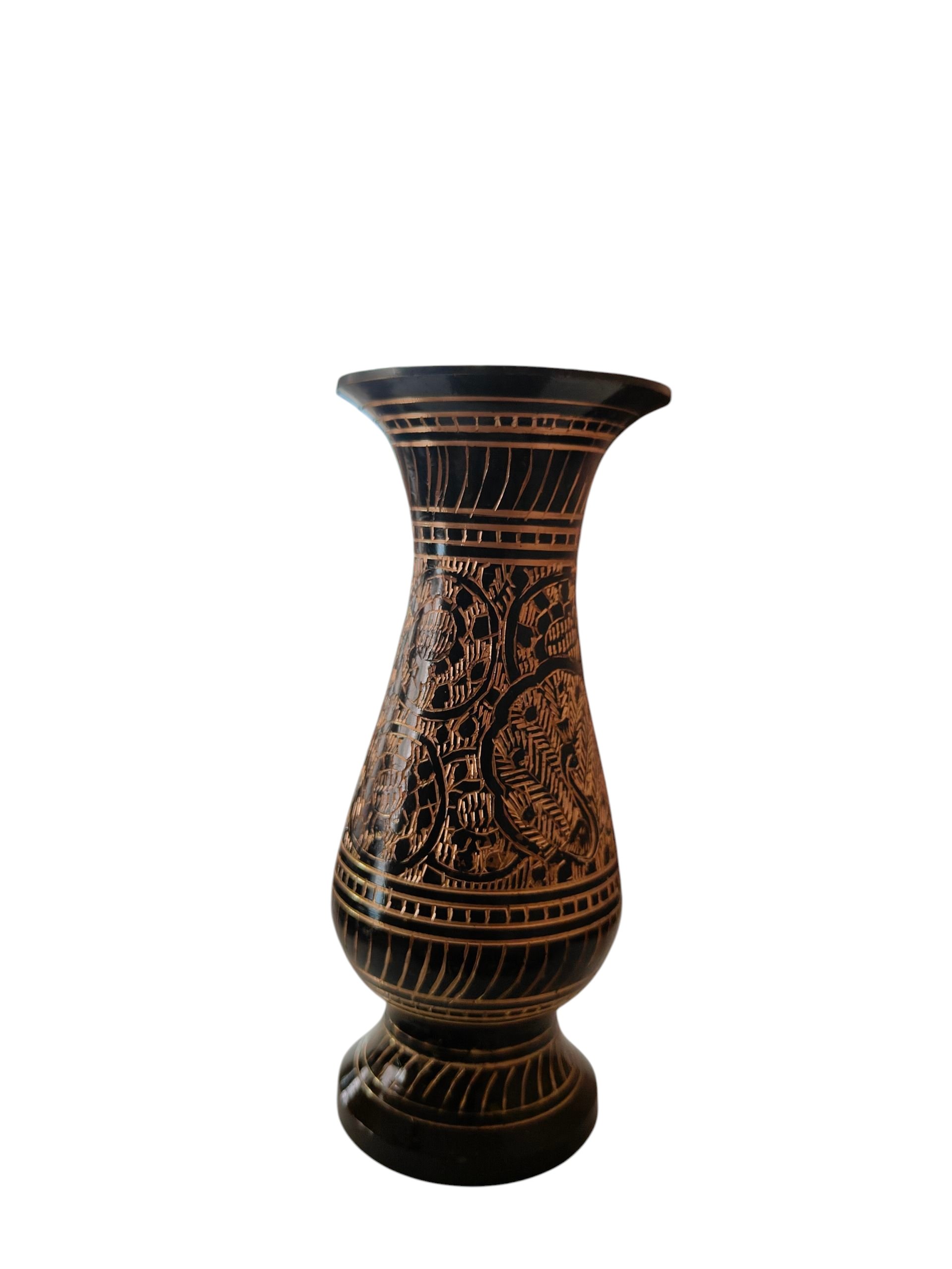 lh decor brass flower vase with work on it.