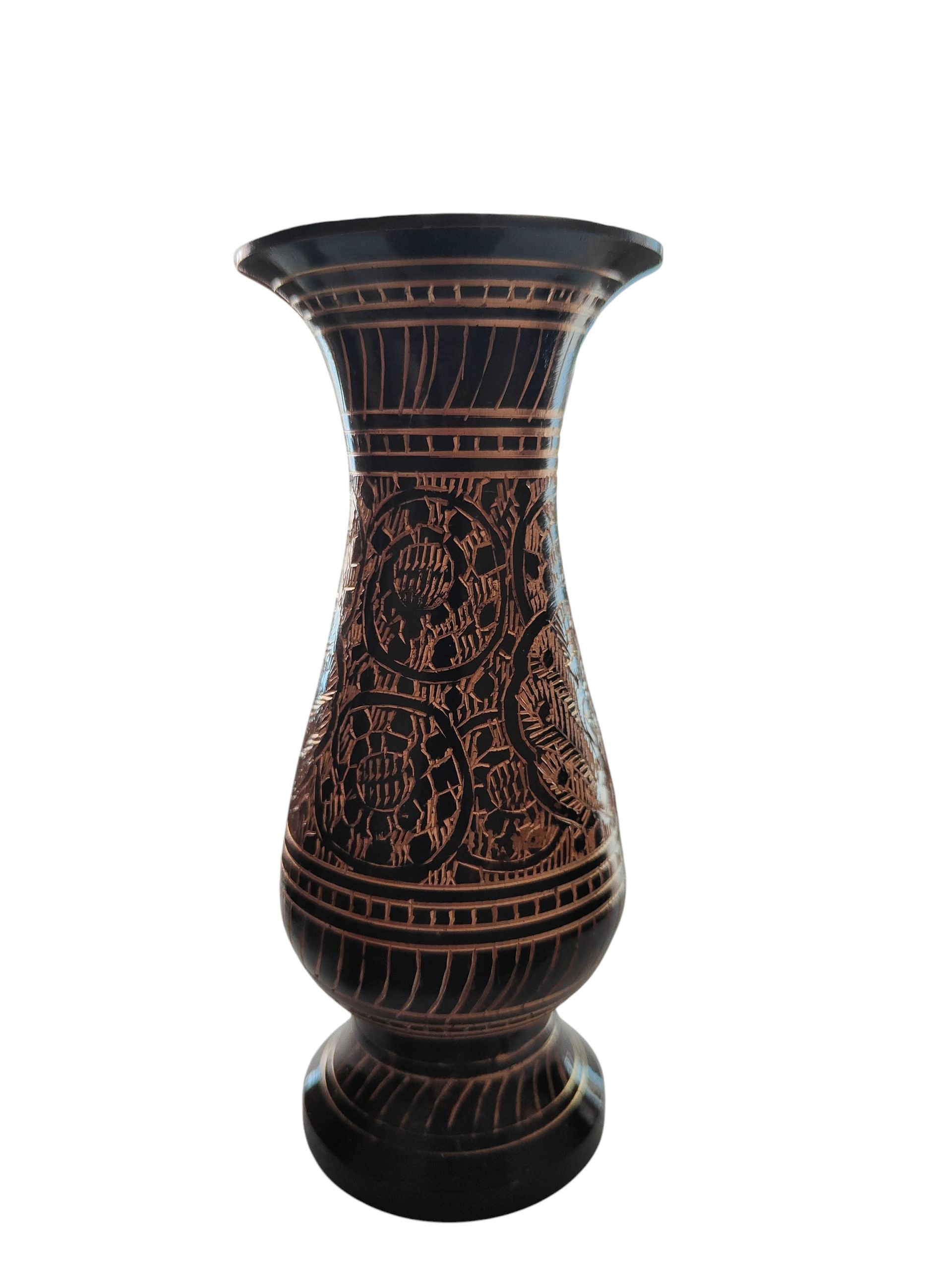 lh decor brass flower vase with work on it.